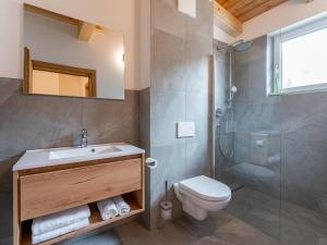 a bathroom with a toilet sink and a shower at Bergzicht 2B in Sankt Lorenzen ob Murau +47 photos