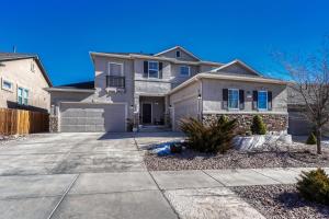 a house with a driveway in front of it at Selah Springs Lodge in Colorado Springs