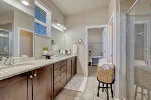 a bathroom with a sink and a shower at Selah Springs Lodge in Colorado Springs +43 photos