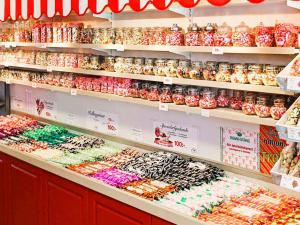 a store shelf filled with different types of food at 4 star holiday home in ÖDESHÖG in Ödeshög