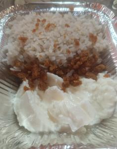 a glass bowl with rice at Pranalay HS Warm and Cozy in Tezpur