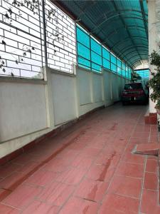 a car parked in a building with a parking lot at Anh Đàm Motel in Vĩnh Phúc