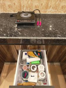 Cuina o zona de cuina de Aura Stays 2bhk