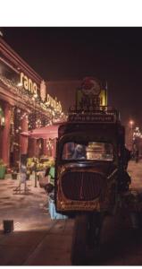 a truck parked in front of a store at night at Aastha view inn in Amritsar