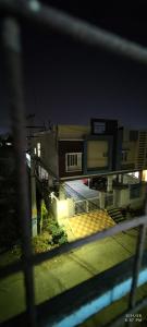 a view from a window of a building at night at Kurnool Homestay in Kurnool