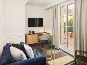 TV a/nebo společenská místnost v ubytování H10 Casa Mimosa 4* Sup