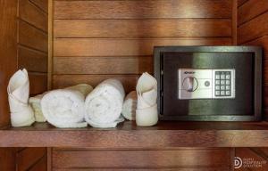 a counter with a microwave and some sliced mushrooms at Sunset Cave Villas Lembongan in Nusa Lembongan
