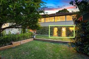 a house with a garden in front of it at Central Chatswood Urban Stay in Sydney