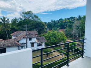 a view from the balcony of a house at The Ondoro in Kamburugamuwa