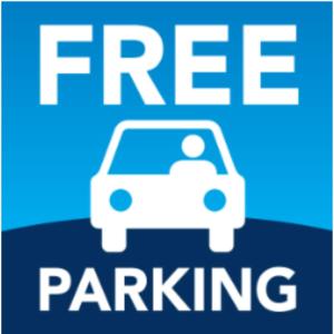a sign that says free parking with a car at Villa Magnolia B&B in Taormina
