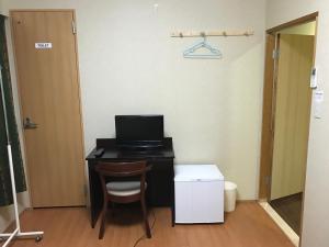 TV a/nebo společenská místnost v ubytování Hotel Famitic Myojin