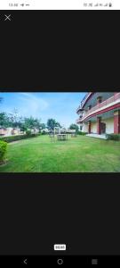 a view of a park with a picnic table at Hotel Pink Haveli in Jaipur