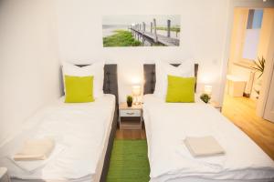 Ένα ή περισσότερα κρεβάτια σε δωμάτιο στο Apartment Haus Heidelberg