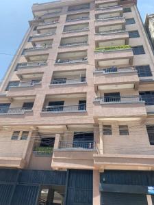 a tall building with balconies on the side of it at RENE haven in Nairobi