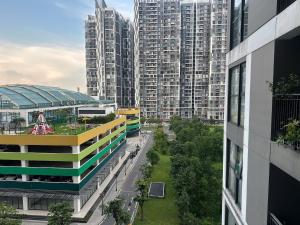a view of a city with tall buildings at R1 Studio Ruby Zenpark in Gia Lâm Pho