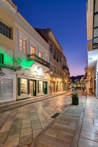 an empty street in an old town at night at Stone&Light in Ermoupoli