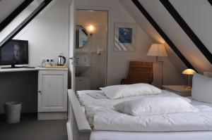 Postel nebo postele na pokoji v ubytování Hotel Witthus GmbH & CoKG