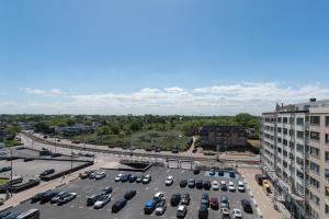 an aerial view of a parking lot in a city at Akropolis odk in Koksijde