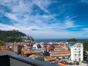 a view of the city from the roof of a building at Koisi Hostel in San Sebastián