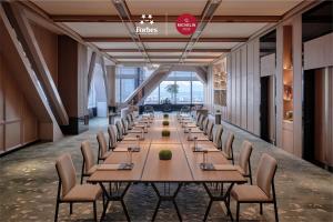 a long dining room with tables and chairs at Park Hyatt Changsha in Changsha +46 photos