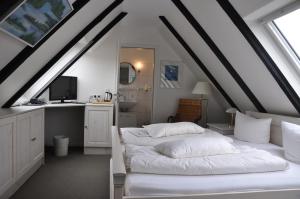 Postel nebo postele na pokoji v ubytování Hotel Witthus GmbH & CoKG