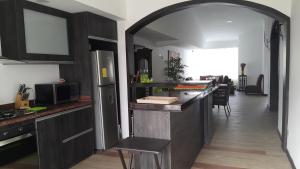 Cucina o angolo cottura di Hospedaje Solymar Sarie Bay
