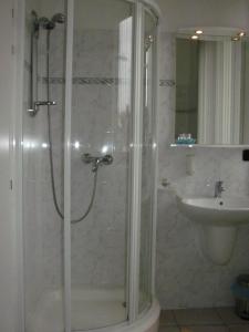 Koupelna v ubytování Hotel Isora