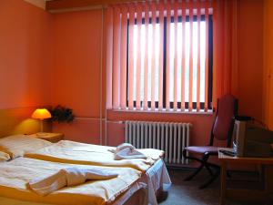Postel nebo postele na pokoji v ubytování Hotel Isora