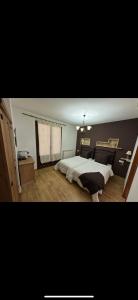 a bedroom with a large bed in a room at Casa rural marga in Tardienta
