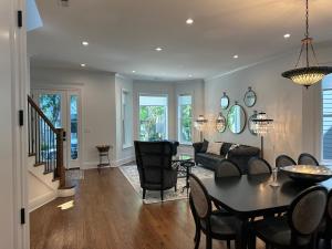 a living room with a table and a couch at The Lyons' Den in Chicago
