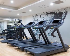 a row of treadmills in a gym at Sheraton Miyako Hotel Osaka in Osaka
