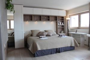 Ένα ή περισσότερα κρεβάτια σε δωμάτιο στο Panoramic Luxury Little Penthouse