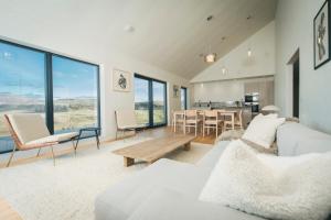 a living room with a couch and a table at The Star House in Glendale