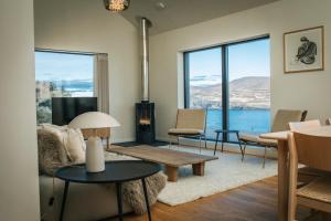 a living room with a view of the water at The Star House in Glendale