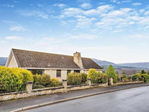 a house on the side of a road at 2 Bed in Killin oc-pe512 in Killin