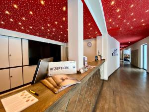 a kitchen with a counter with a box on it at Hotel Credé in Kassel