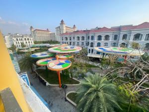 an overhead view of a resort with many surfboards at Tropical Bay Villas and Homestay in Phú Quốc