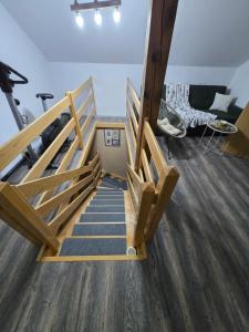 an overhead view of a room with two bunk beds at Kuća za odmor Velnira in Ozalj