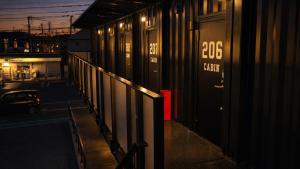 a building with the number on the side of it at ホテルクレイドルキャビン田無 in Nishitokyo +12 photos