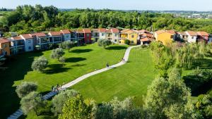 an aerial view of a park with houses at Belvedere Village in Castelnuovo del Garda
