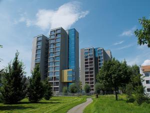 a rendering of a building in a park at Domeq FREE Parking, Gym, Co-working and Terrace in Komárov