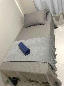 a pair of beds in a small room at Dunas residence casa 03 in Santo Amaro