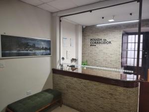 a lobby with a reception desk in a building at Posada Del Corregidor in Cajamarca