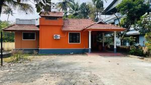 a small house with an orange at Jas Grand Inn in Cochin
