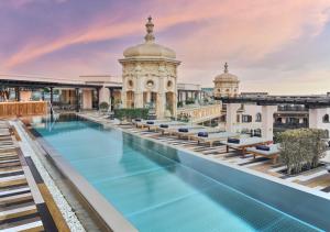 a view of the pool on the roof of a building at Santa Catalina, a Royal Hideaway Hotel - Gran Lujo in Las Palmas de Gran Canaria