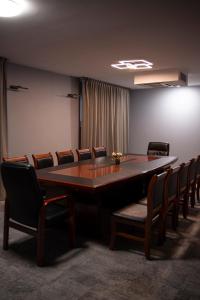 a conference room with a large table and chairs at Villa FOREST in Poznań +35 photos