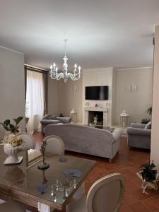 a living room with a couch and a table at La Dimora in Morino