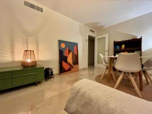 a room with a bed and a table and chairs at Casa2Iberia in Benissa +33 photos