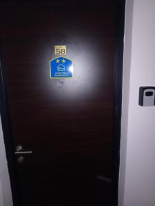 a sign on the door of a elevator at Aria lux Titova vila in Zlatibor