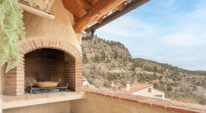 an outdoor oven with a view of a mountain at El Kubo in Olba